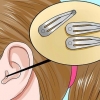 Sortir quelque chose de ton oreille