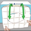 Utiliser une housse de siège de toilette