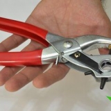 Percer un trou dans une ceinture