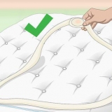 Empêcher les draps de glisser d'un lit