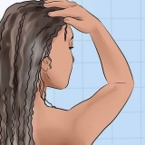 S'assurer que la transition des cheveux défrisés aux cheveux nature...